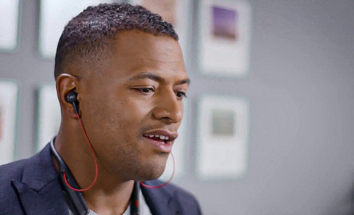 Man Using Voyager 6200 UC Headset